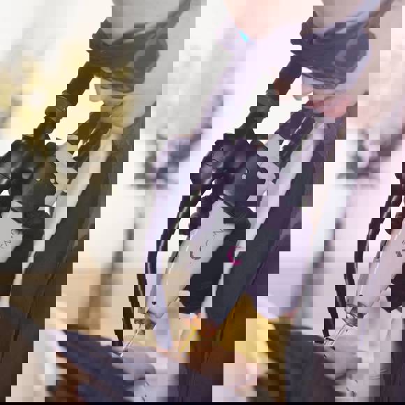 Specialist performing laser skin treatment with advanced technology at Opsis Clinical