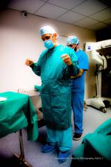 Dr Ioannis Liapakis preparing for surgery at the operating room